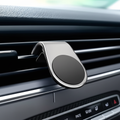 Silver magnetic car phone mount on air vent